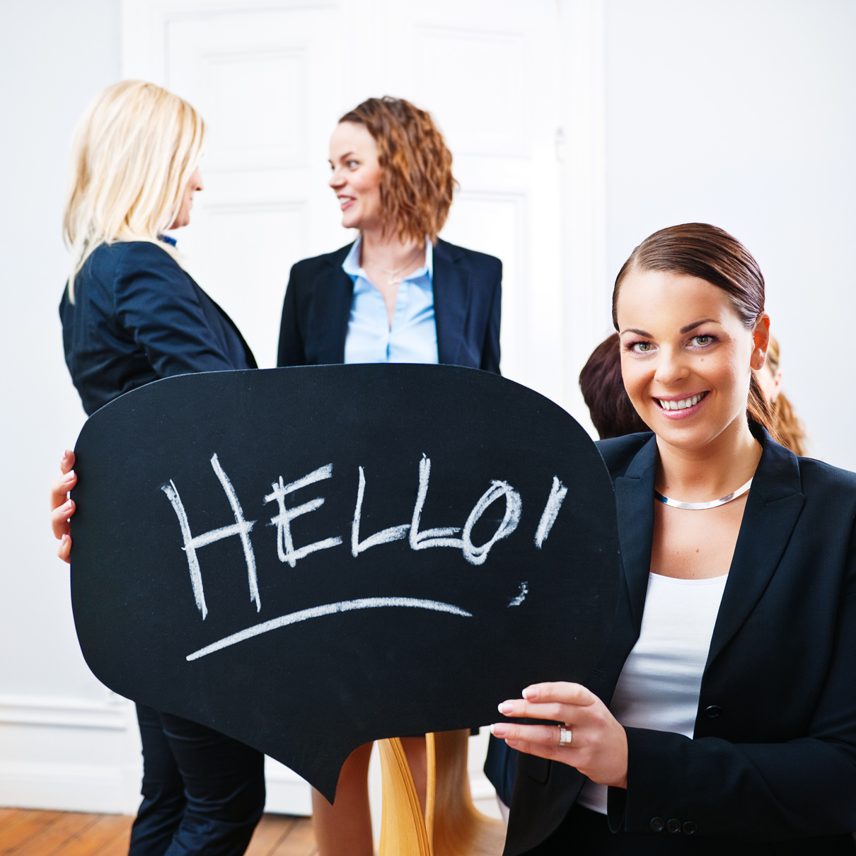 Business woman saying hello